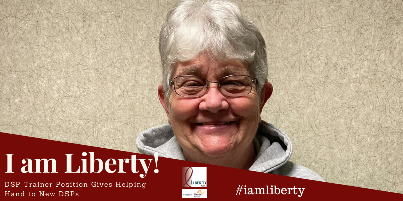 Sue Ferry with Liberty Banner I am Liberty Story: DSP Trainer Position Gives Helping Hands to New DSPs. Headshot of Sue Ferry.